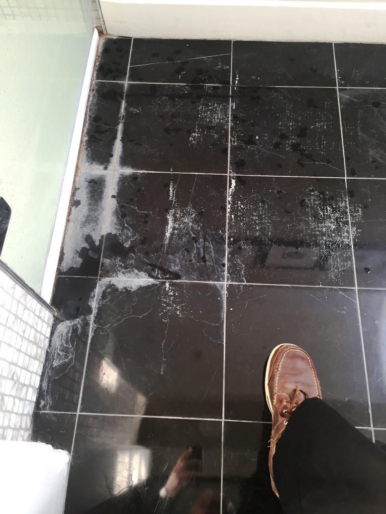 removing-limescale-from-polished-black-marble-floor-tiles-in-a-baldock